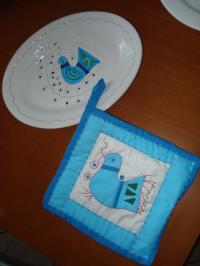 presine per pentole in patchwork con uccellino