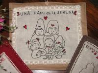 pannello ricamato dedicato alla famiglia serena